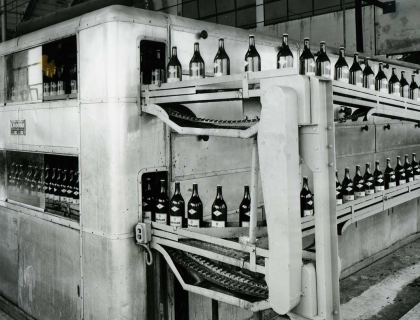 historical picture showing wine bottles